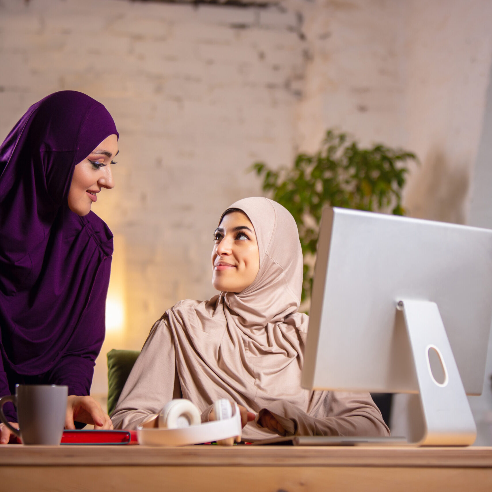 Happy muslim woman at home during online lesson. technologies, remote education, ethnicity concept