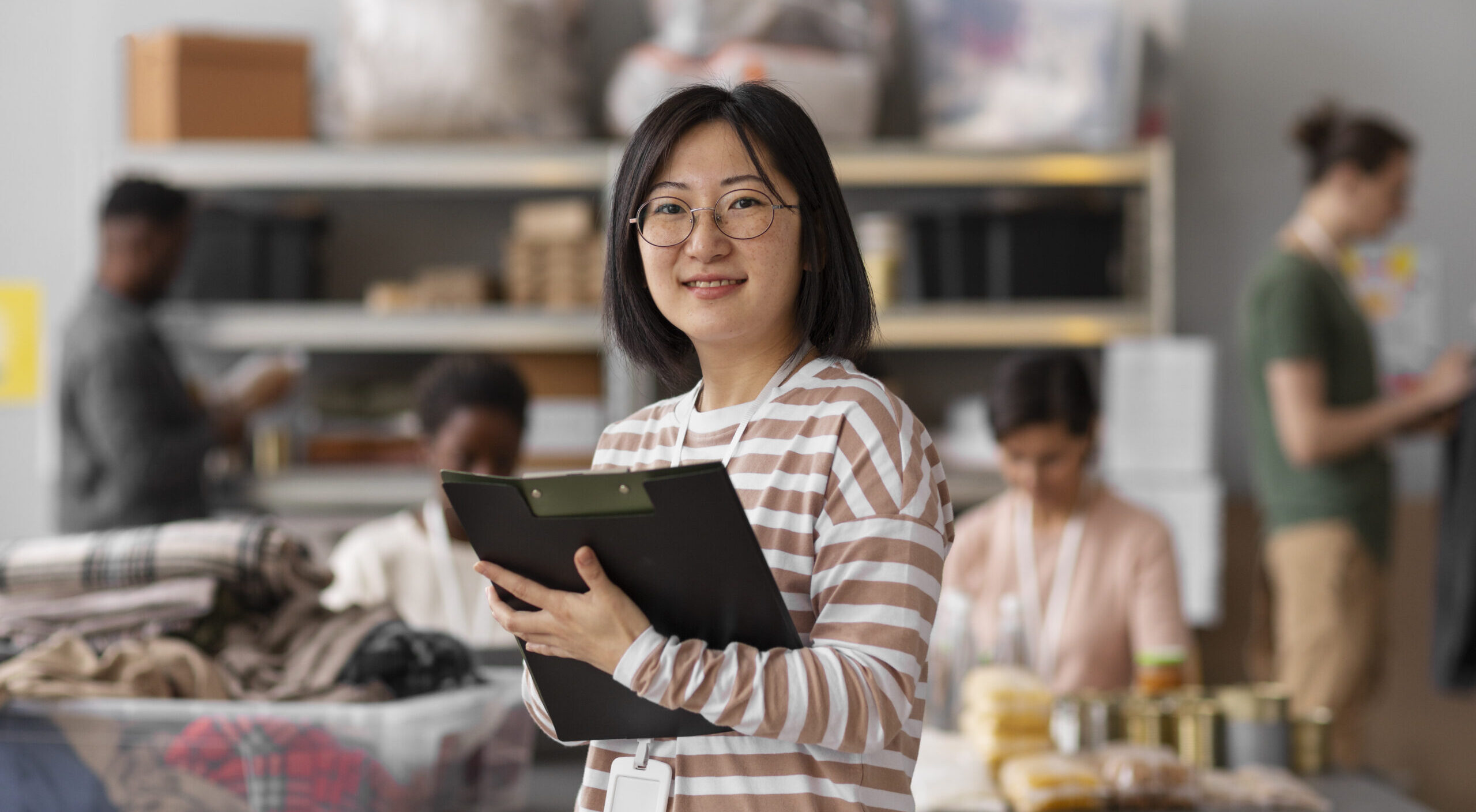 volunteer-organizing-donations-charity